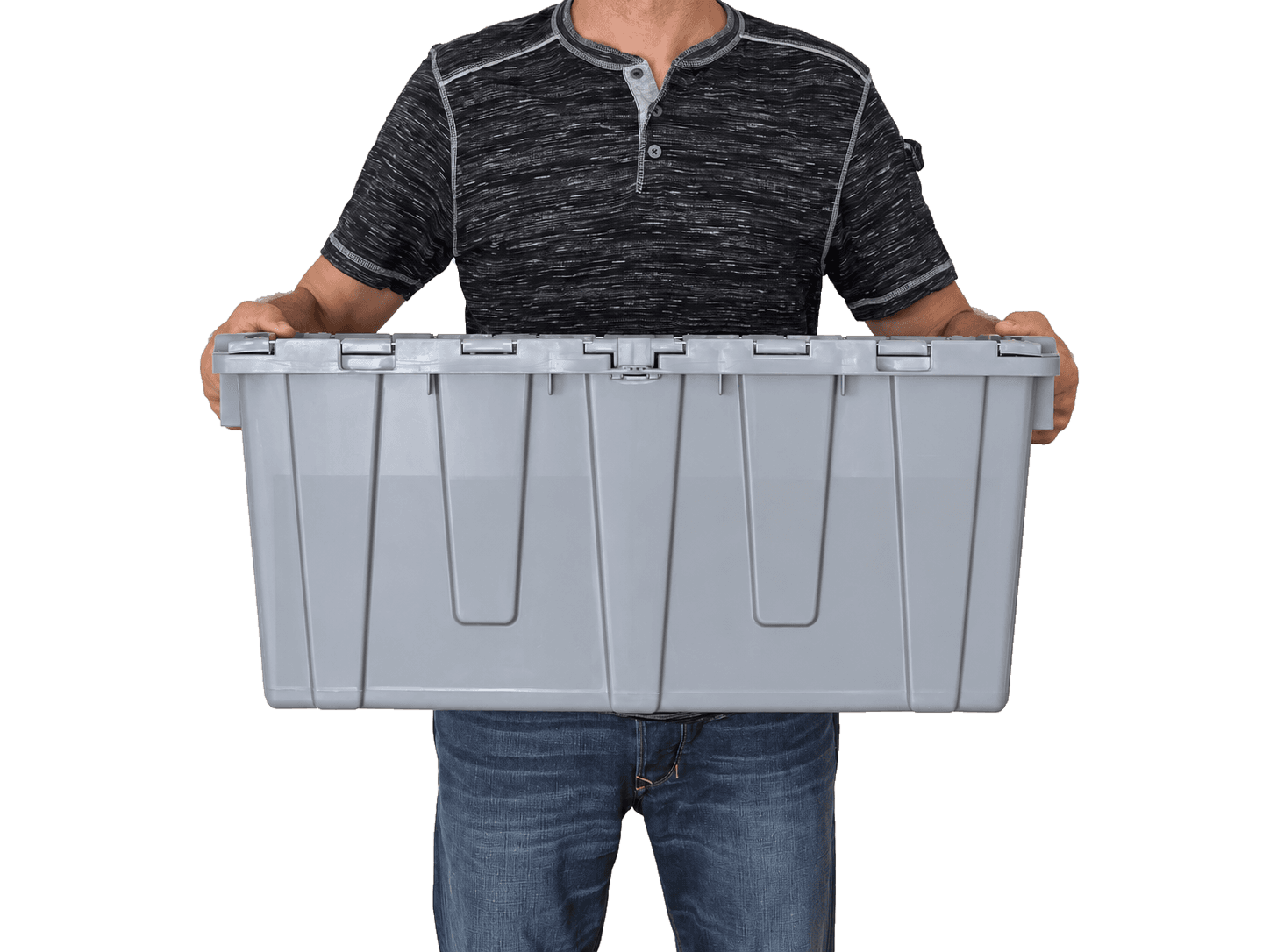 Adult holding a closed moving tote by its side handles at waist height